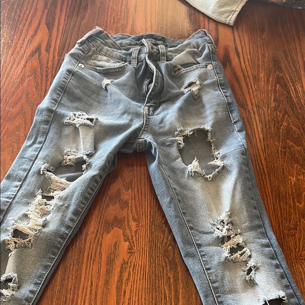 Distressed Blue Jeans